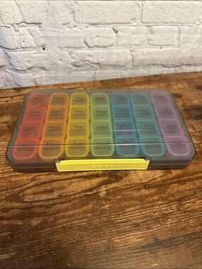 Rainbow Weekly Pill Organizer with Yellow Latch